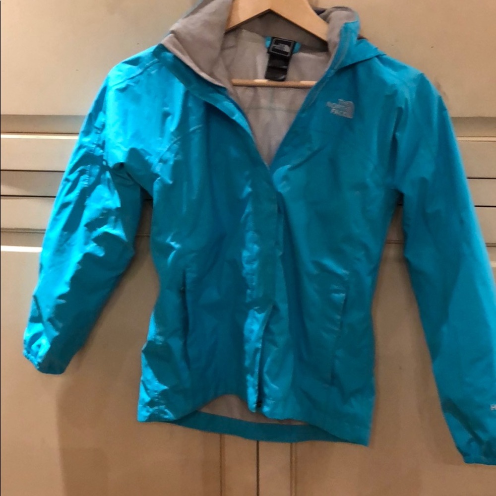 Girls 10-12 turquoise North Face rain jacket.